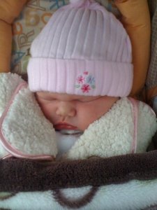 Isabel goes for a ride in the car.